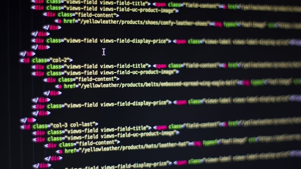 HTML code on a monitor showing web development