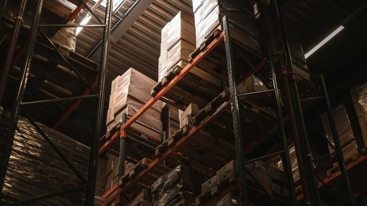 Rows of warehouse boxes - many in use, many forgotten.