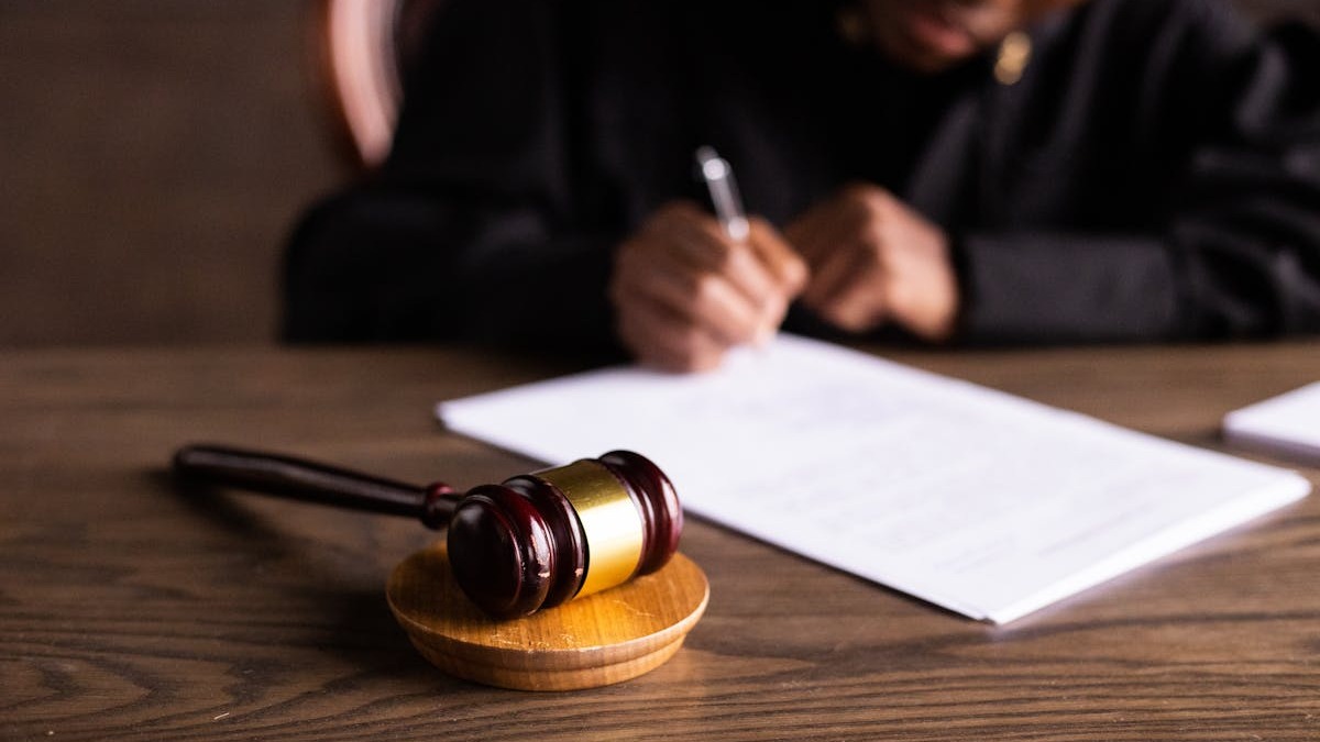 Legal documents and signing in a courtroom setting
