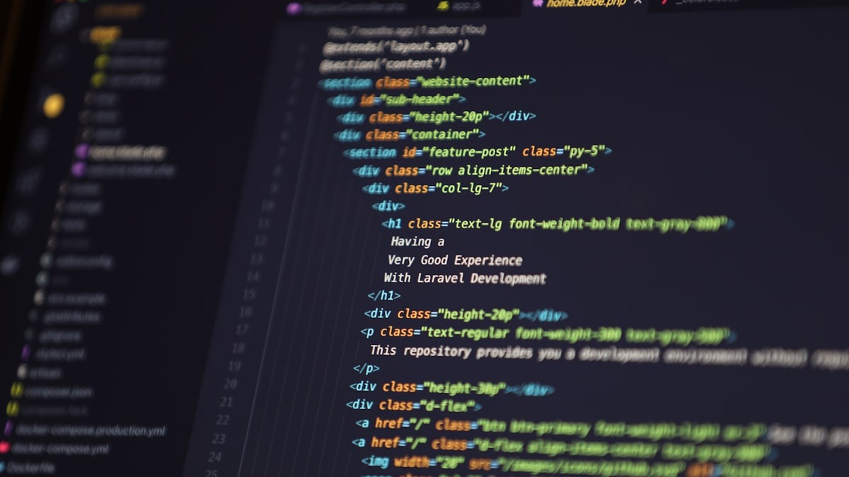 A developer's multi-monitor setup showing code across multiple screens - the kind of workflow the Codex app is designed to orchestrate